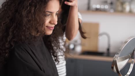 tracking video of hairdresser giving advice to her client