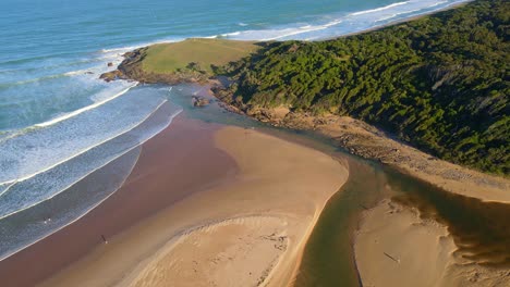 Sunshine-Over-Green-Bluff-Headland-And-Creek-Near-Moonee-Beach-In-Mid-North-Coast,-Australia