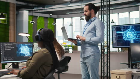 team of programmers in office developing software applications using ai