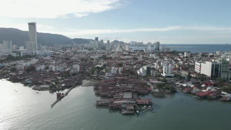 Aerial-view:-George-Town-skyscrapers-and-waterfront-jetty-in-Malaysia