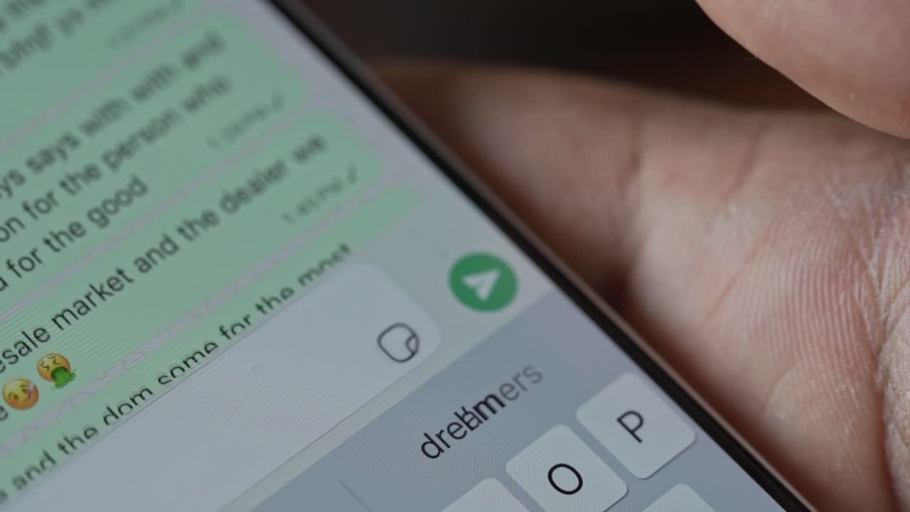 Pressing the send button on a messenger after chatting on a smartphone