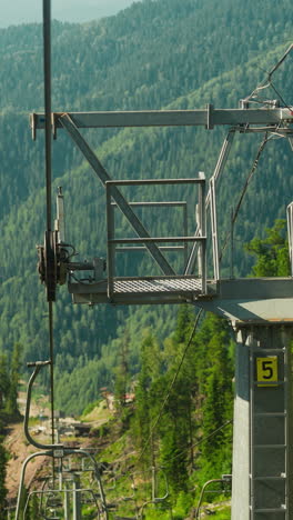 chairlift automatic system for moving uphill on cable car with incredible view of beauty of nature. transport for tourists for quick lift up slow motion