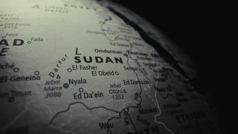 close-up of a world globe map, focusing on sudan