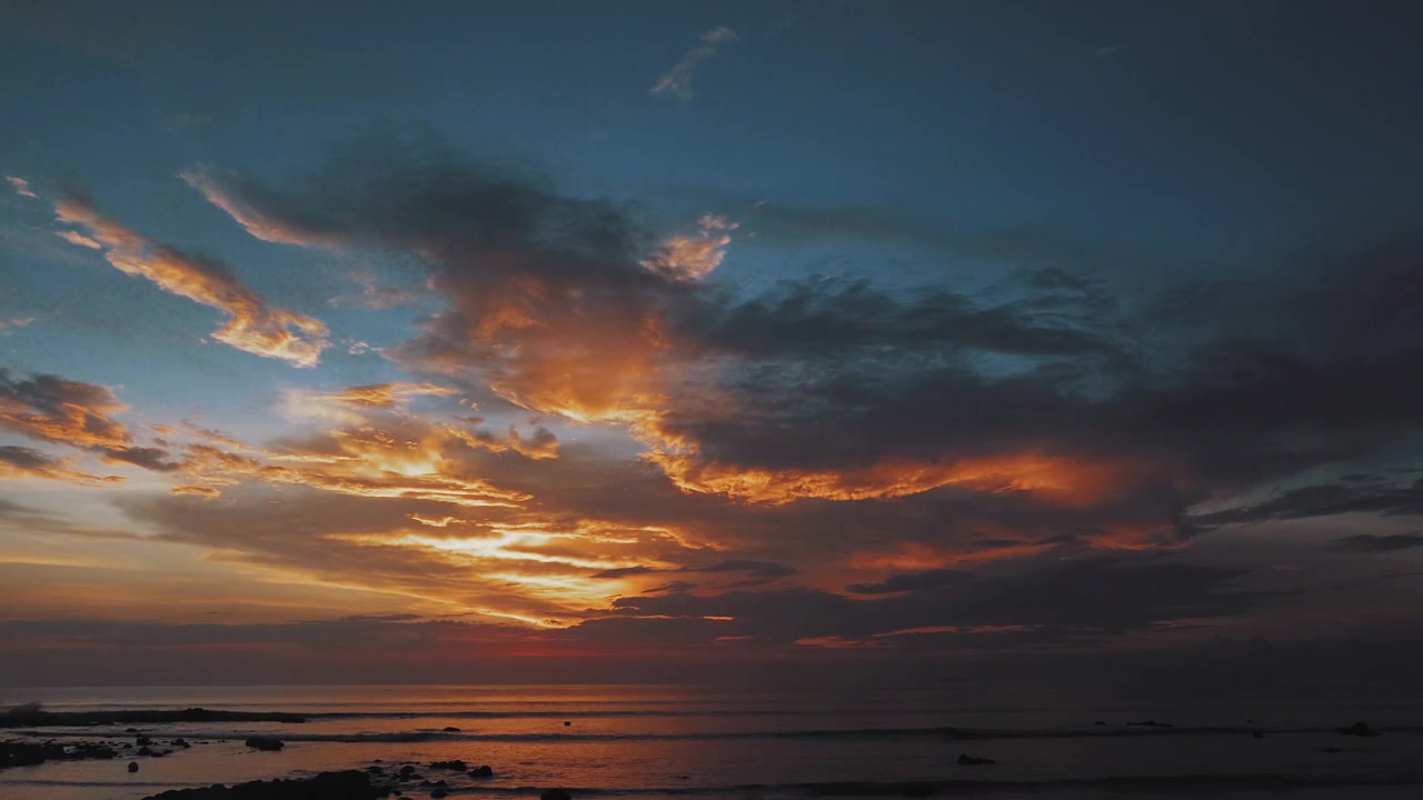 Sun set hiding behind majestic clouds in Koh Lanta Thailand
