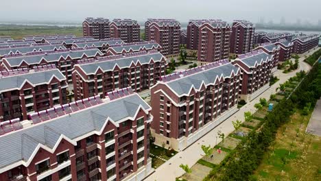 aerial view over a residential complex in cloudy nanhai new district, china