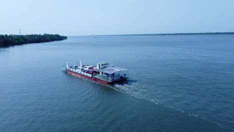 a jankar service that transports small vehicles to the boat jetty of a beautiful island. perumbalam island lake transportation in kerala, india