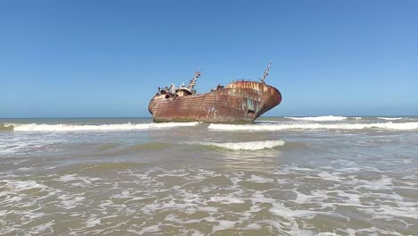 abandoned fishing boat after it ran aground and crashed on the shores