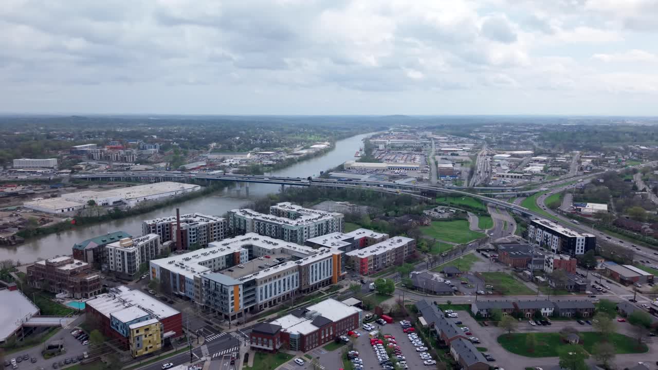 Cars Commuting On Bridge Over Cumberland River, South Of Downtown Nashville In Tennessee.