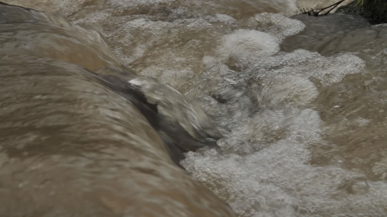 Floating stick and brick on the water