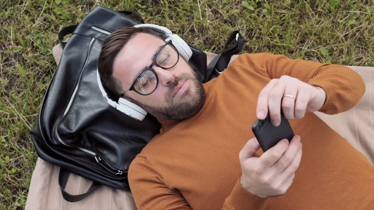 Man Lying on Ground Relaxing