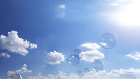 soap bubbles floating towards the clear blue sky with clouds and bright sun