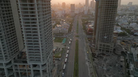 Half-Finished-Hotels-Tower-Over-Wide-Danang-Streets-At-Sunset-In-Vietnam