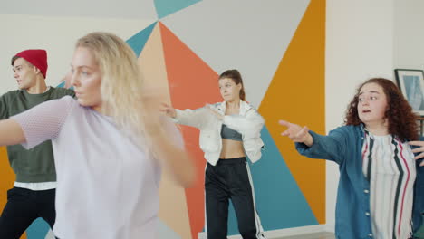 teenagers dancing in a class
