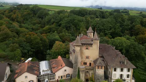 pull back drone shot right above vaumarcus castle in canton of neuchatel switzerland