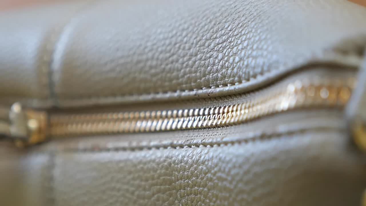Close-up of a zipper on leather