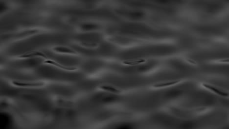 splashes and drops on the surface of the liquid. abstract black background water vibration. 4k slow motion 100 fps, prores 422, 10 bit