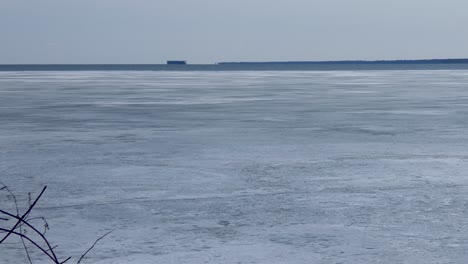 ice retreats on a frozen bay in early spring.