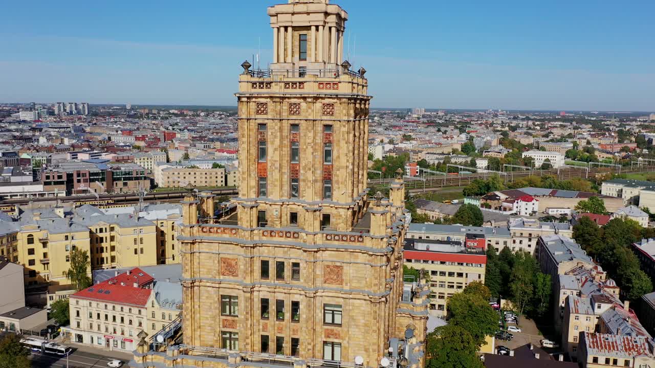 Iconic tower of Riga Academy Of Sciences dominates skyline as drone flies up