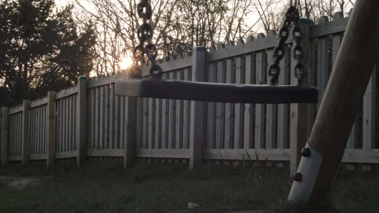 Swing set at sunset