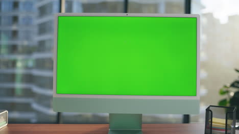 green screen template monitor at workplace closeup. mockup pc computer interior