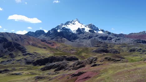 Drone-video-of-a-snow-mountain-peak-in-the-andes,-in-Peru