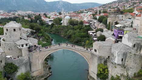 mostar old bridge bosnia and herzegovina rising drone aerial view