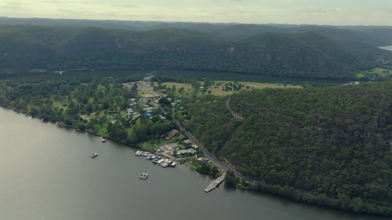 Drone footage of Webbs Creek Ferry crossing and Wiseman's Ferry on the Hawkesbury river, Australia