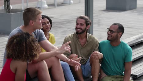 cheerful young people talking outdoor