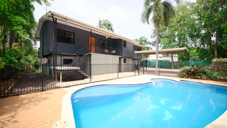 large elevated property container house backyard pool and recreational gathering area