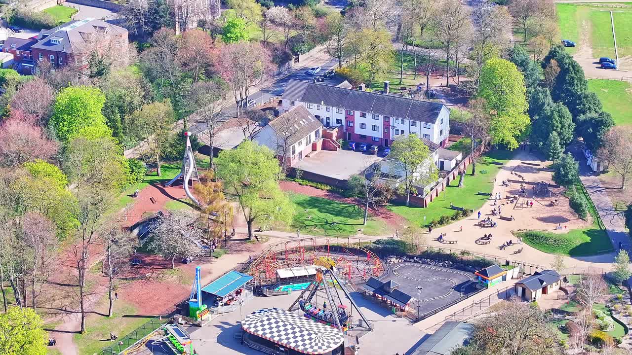 Aerial look over city playground space with spring colors and clearly visible walking trails, Clifton Park Rotherham UK