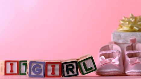 its a girl message in letter blocks