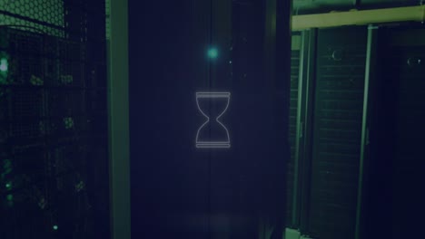 animación de un reloj de arena en círculo contra la sala del servidor en el fondo.