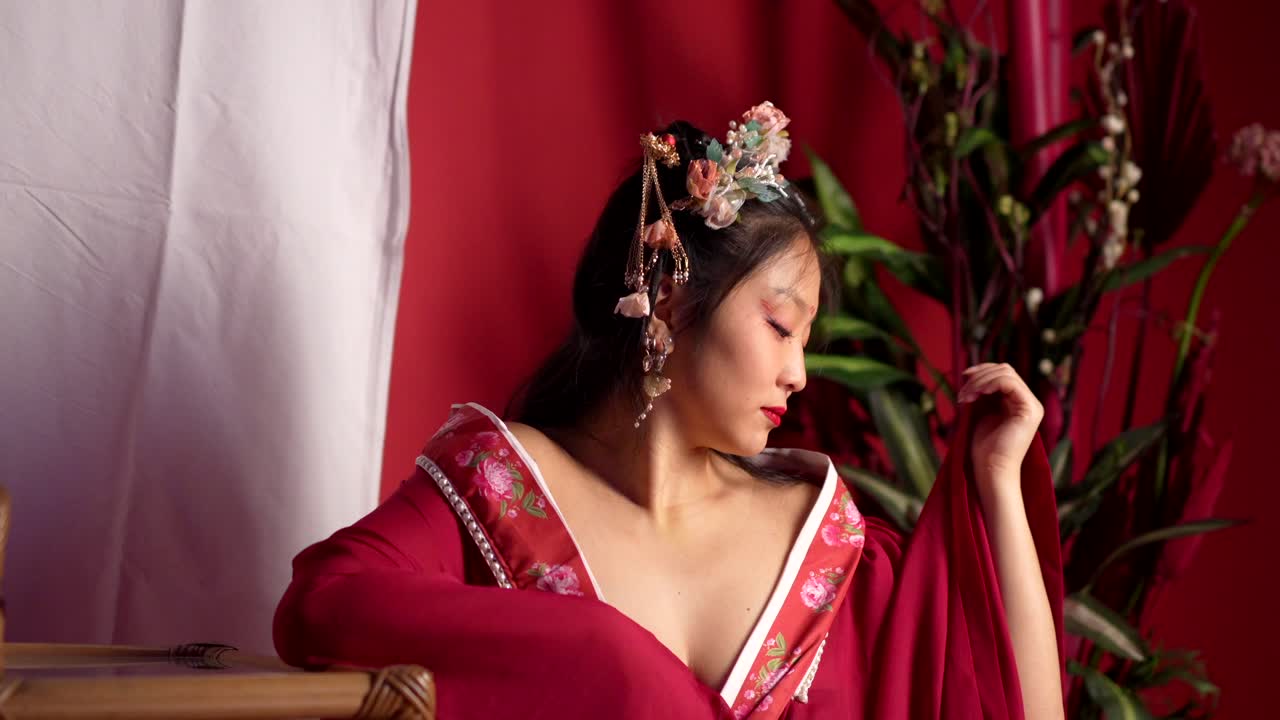 Elegant Woman in Traditional Red Gown