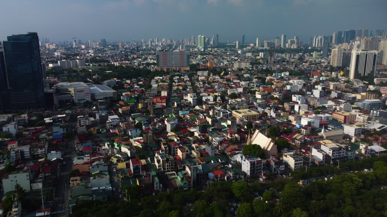 Drone flying over the Manila south cemetary and the Olympia Barangay in Philippines