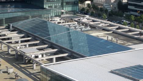 rooftop view of modern commercial building with glass roof