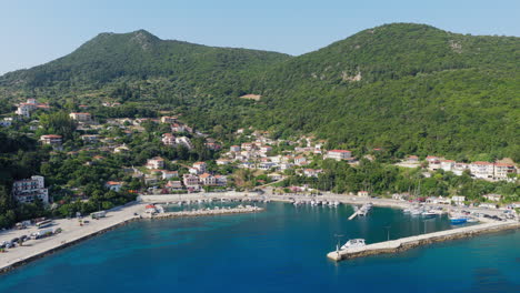 drone view of poros port in kefalonia island, greece, luxury summer travel along ionian sea