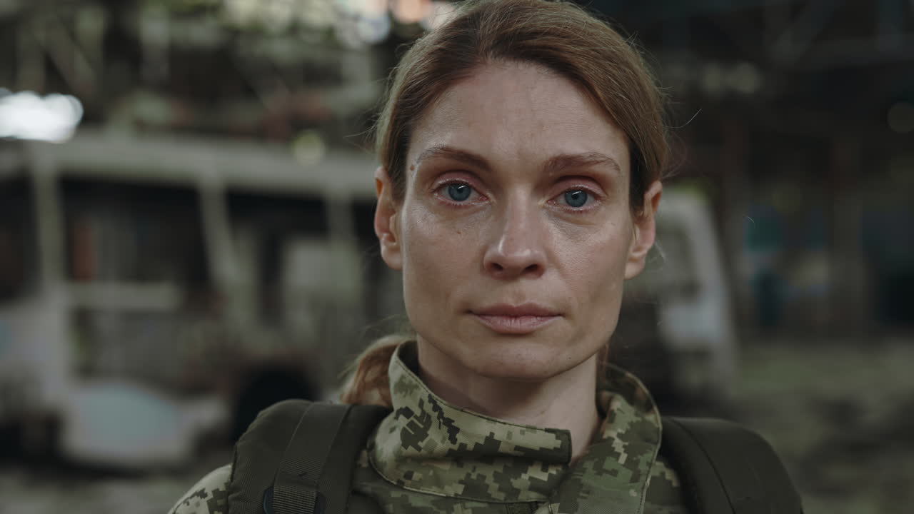 Portrait of a Soldier in a War-Torn Area