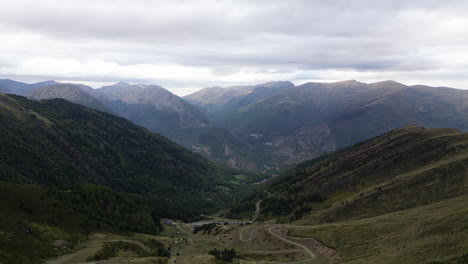 Drone-Shot-over-a-valley-in-the-mountains