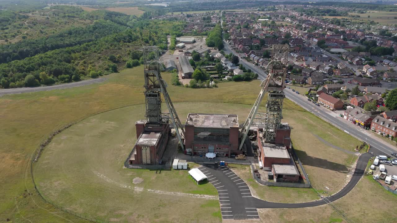 Aerial drone view of Clipstone colliery coal mine headstocks with rural countryside Nottinghamshire England UK