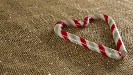 falling snow with christmas heart decoration