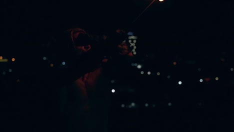young blond male breathes out large stream of fire making fireball slow motion
