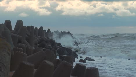 stormy sea waves hitting the port pier