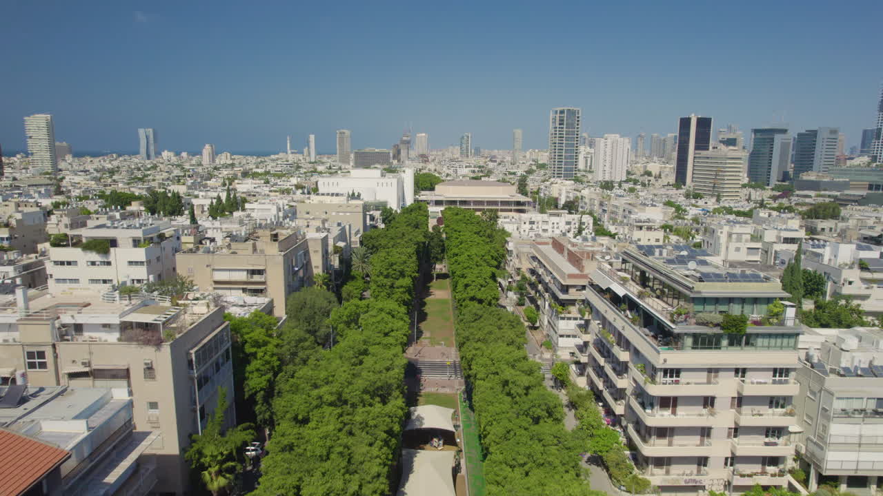Flying above the trees of Rothschild blvd to Habima Theater new building In Tel Aviv and Menashe Kadishman statue, it's a social and dating meeting place