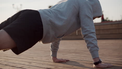 man doing push-ups outdoors