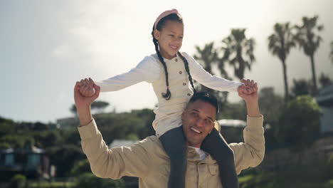 Beach,-walking-and-father-with-child-on-shoulder