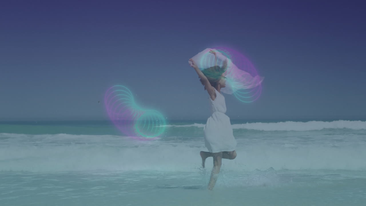 Running on beach, woman with colorful light patterns creating animation in sky