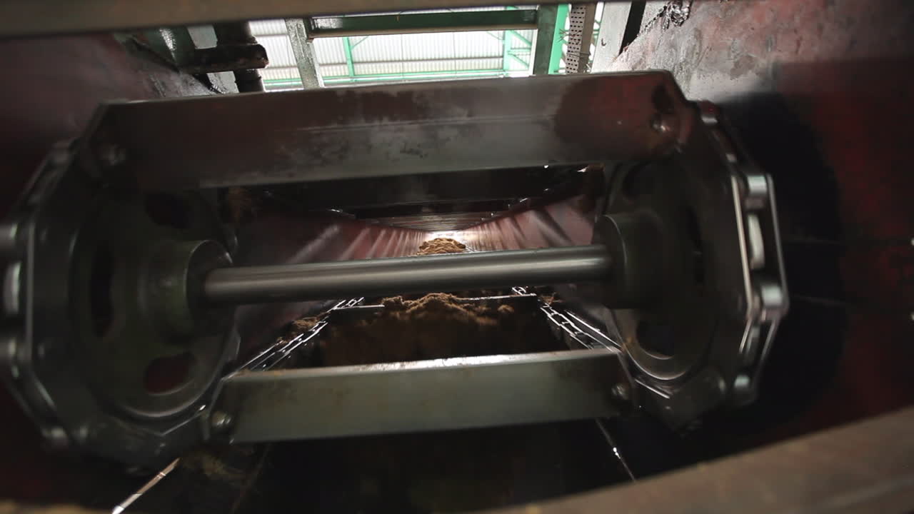 Production machine processing and producing palm oil in a huge factory in Malaysia