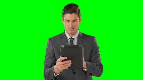 Businessman-using-digital-tablet