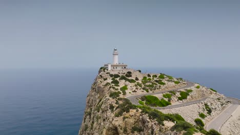 Slow-aerial-ascend-and-tilt-down-near-Formentor-Lighthouse,-Mallorca