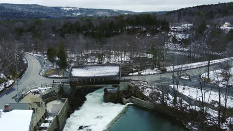 4K-aerial-drone-pull-back-of-Quechee-Vermont-and-its-iconic-covered-bridge-and-fall